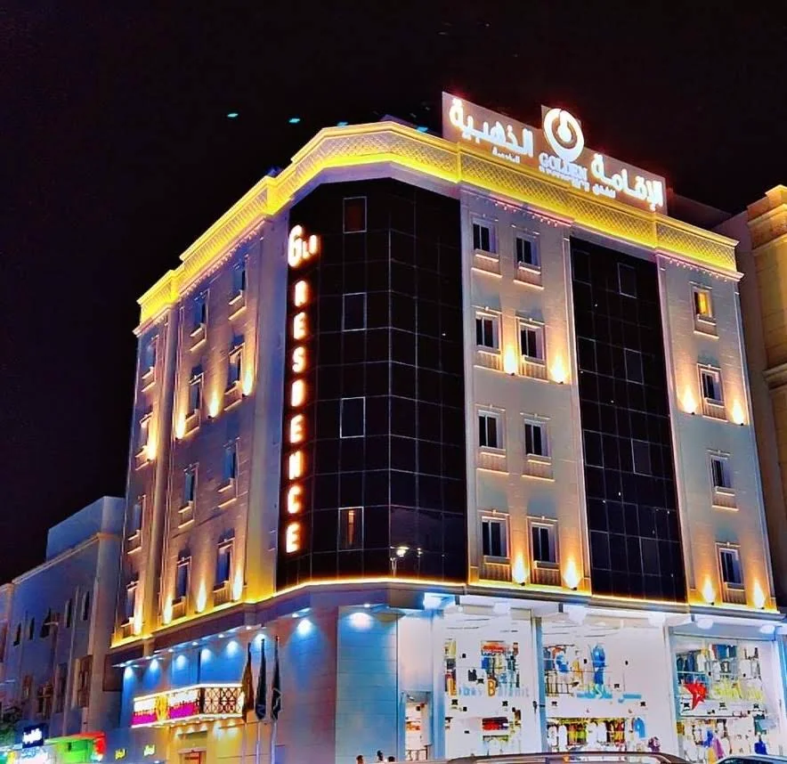 The residence exterior at night