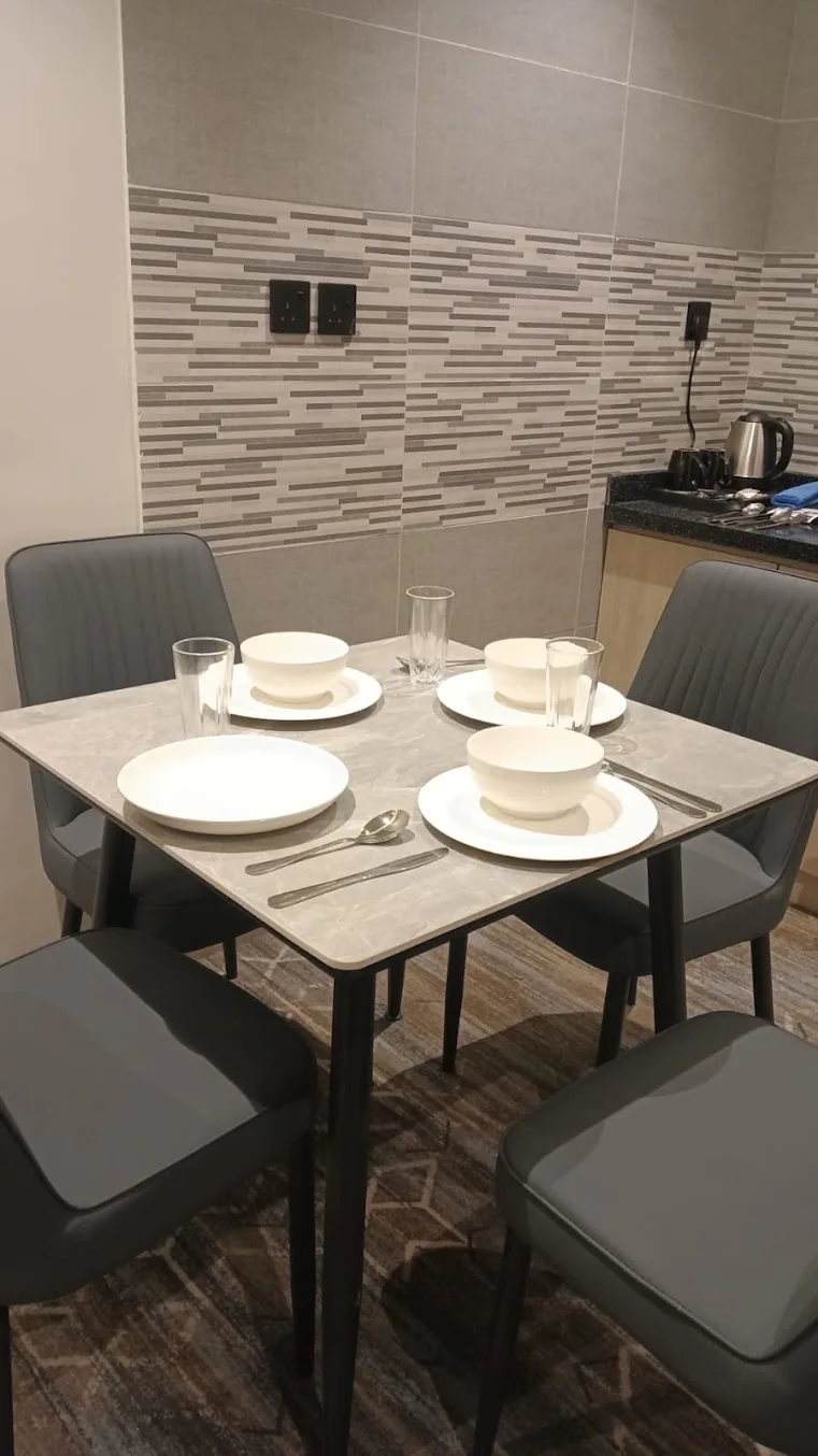 A dining and preparation area inside a unit